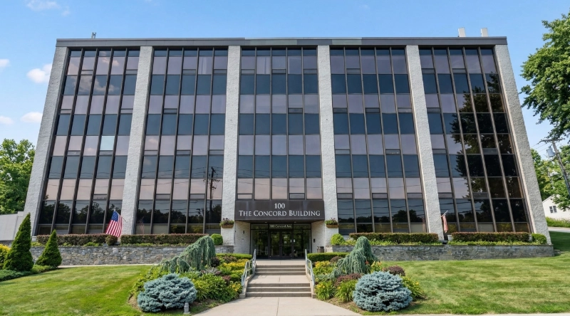 Exterior view Vein Treatment Clinic a modern medical office building under a clear blue sky.