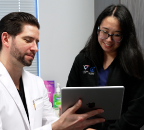 Doctor with tablet consult photo