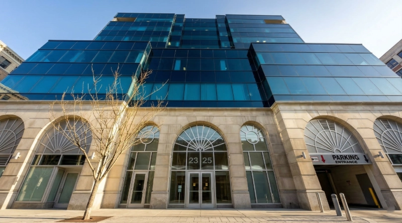 Exterior view Vein Treatment Clinic a modern medical office building under a clear blue sky.