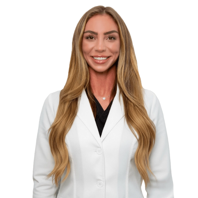 A professional portrait of a Physician Assistant at Vein Treatment Clinic. She is wearing a white medical coat and standing with her arms crossed, representing the expert and compassionate clinical team dedicated to patient care and pain relief.