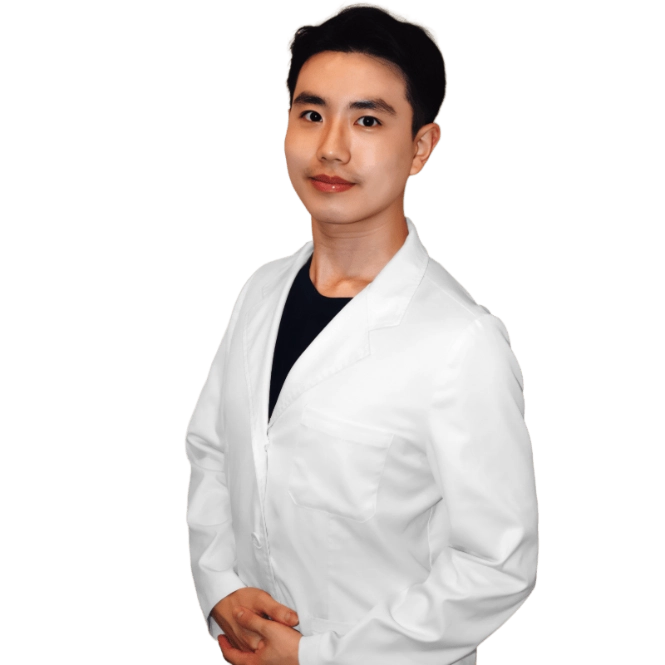 A professional portrait of a Physician Assistant at Vein Treatment Clinic. She is wearing a white medical coat and standing with her arms crossed, representing the expert and compassionate clinical team dedicated to patient care and pain relief.