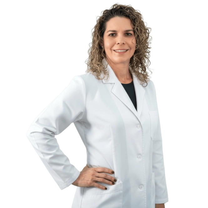 A professional portrait of a Physician Assistant at Vein Treatment Clinic. She is wearing a white medical coat and standing with her arms crossed, representing the expert and compassionate clinical team dedicated to patient care and pain relief.