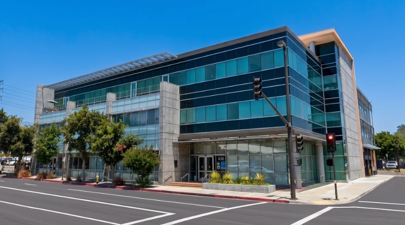 Exterior view of VIP Medical group Clinic in Glendale, a modern medical office building under a clear blue sky.