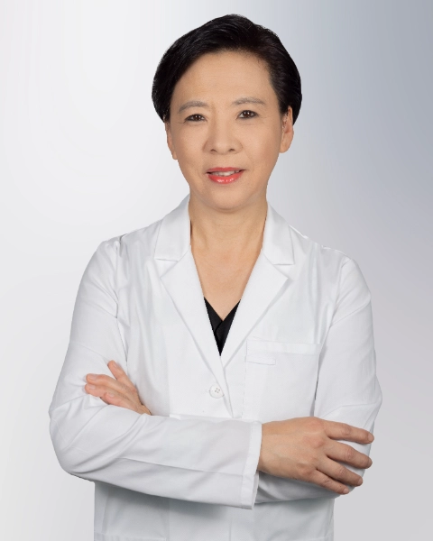 Professional headshot of Dr. Hei Jin Chung wearing a white lab coat, smiling at the camera against a grey background. This is a standard medical professional portrait used for clinic or practice identification.